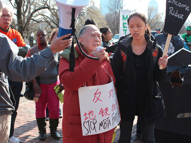 Henry Yee, chairman of the Chinatown Residents Association, addresses the crowd. (Image by Ling-Mei Wong.)